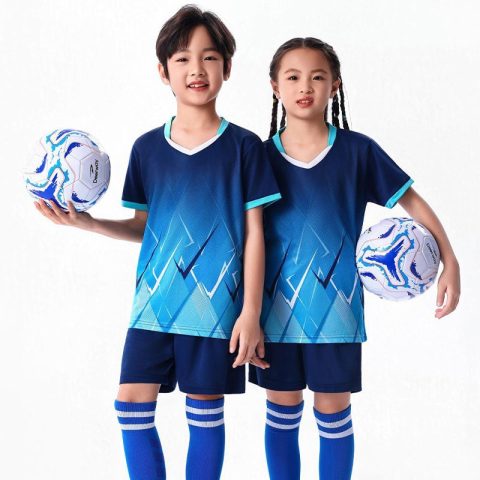 Wholesale youth soccer uniform featuring breathable bird-eye mesh fabric and sublimated gradient graphics.